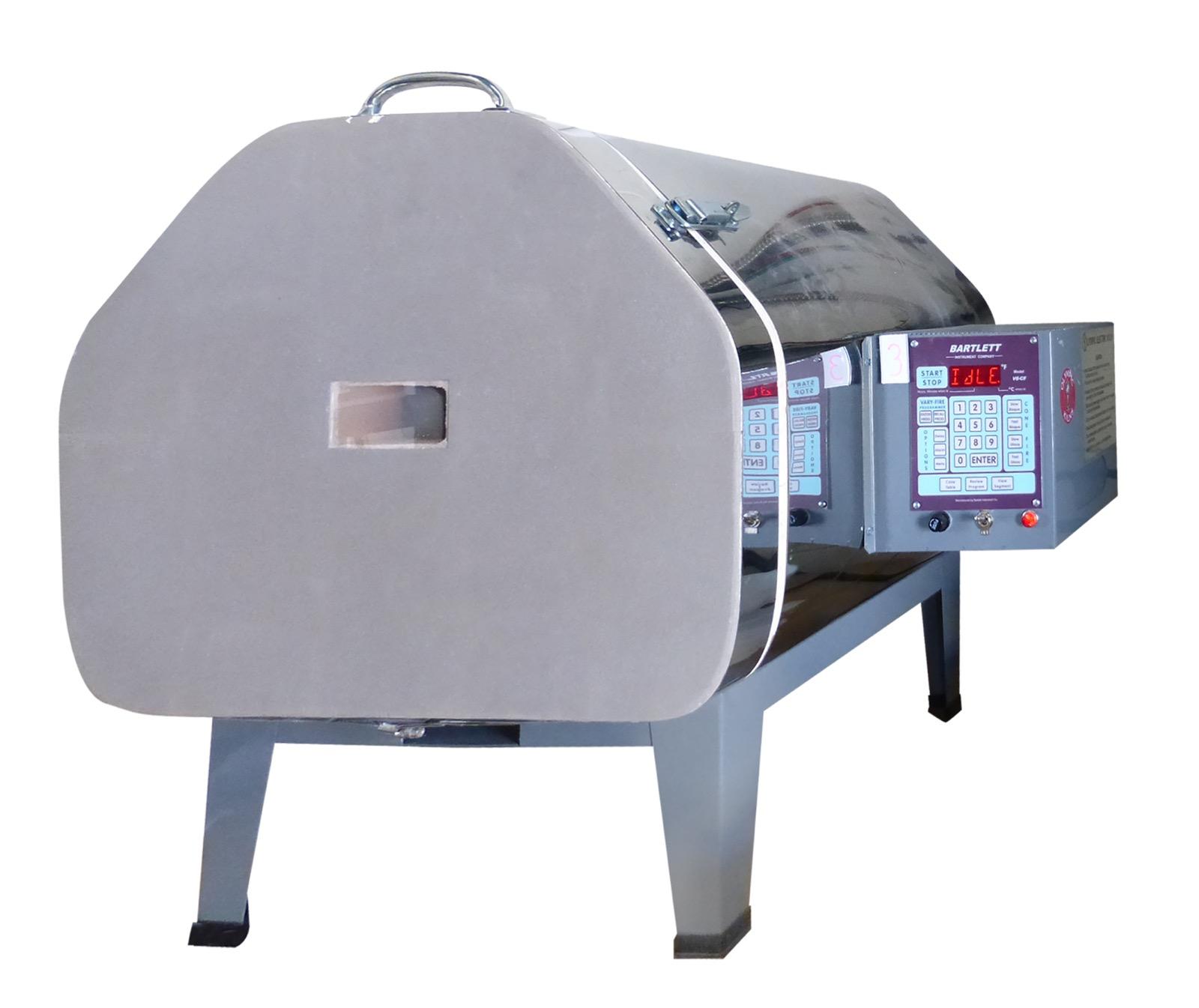 Front-loading kiln with digital controller on a steel stand