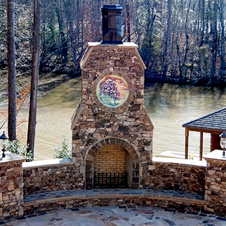 Custom Ceramic Decals on Tile Adorning Outdoor Fireplace